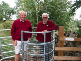 Richmond Rotarians Jos Huddleston (left) and Colin Grant (right) with one of the recently installed gates on path to Willance’s Leap near Richmond
